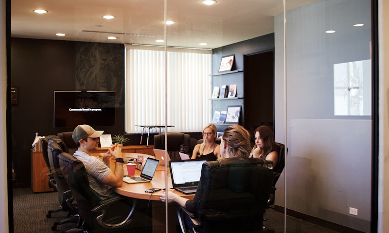 Professionals collaborating at table